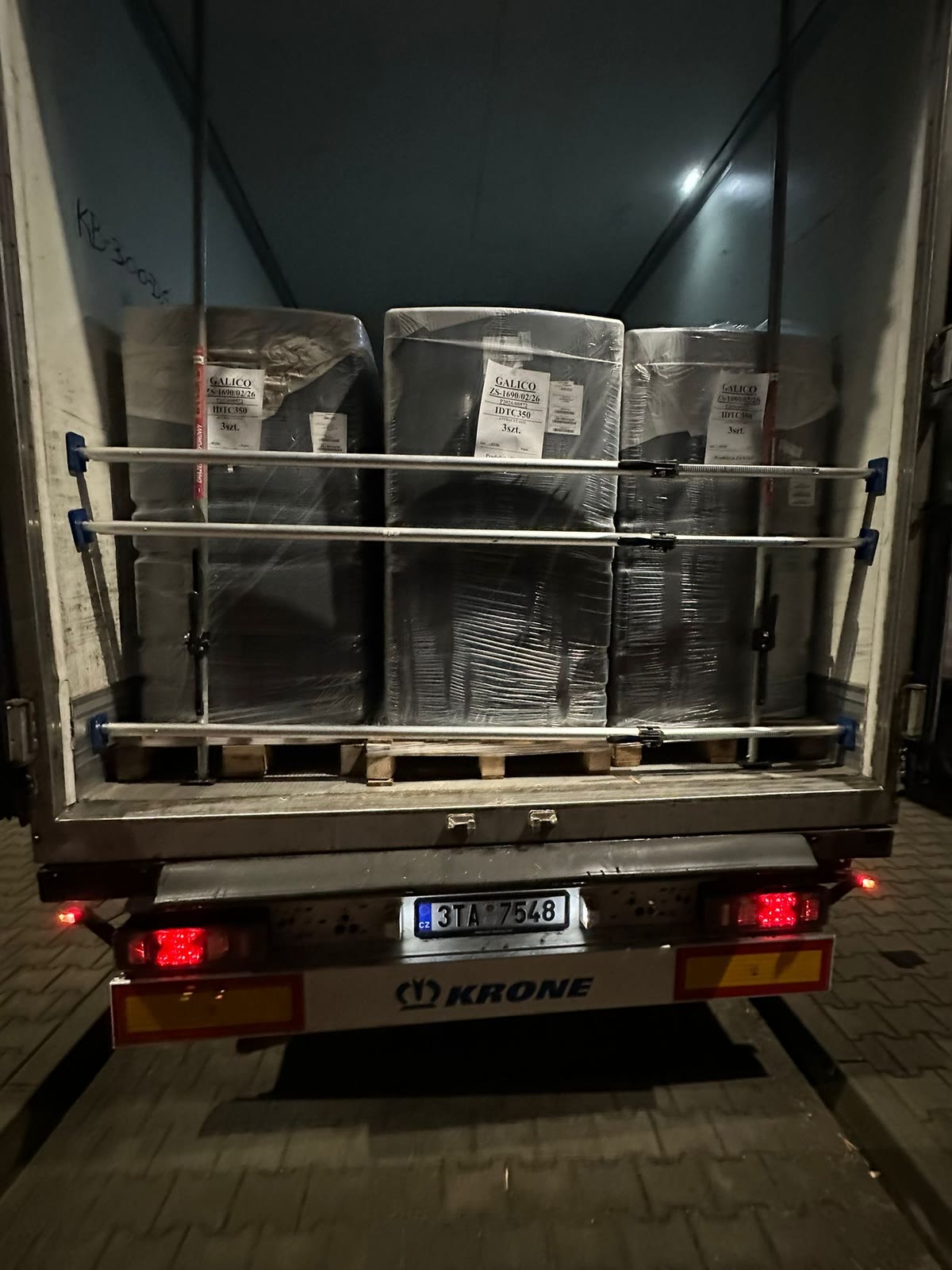 High-value electronics shrink-wrapped and sealed inside a trailer